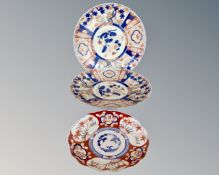 A pair of Imari scalloped edge dishes, width 31 cm,