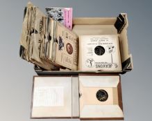 A box containing vintage 78s on Philips, HMV, Colombia, Decker labels.