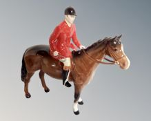 A Beswick huntsman seated on horse no. 1501 CONDITION REPORT: Good condition.