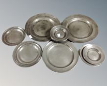A collection of eighteen antique pewter plates