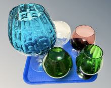 A tray of five oversized brandy glasses