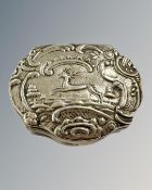 A continental embossed silver snuff box, depicting a running stag, width 6cm.