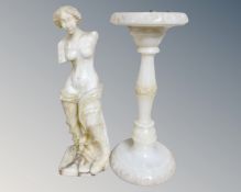 An Alabaster figure of a nude female, together with a smoker's stand,