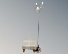 A contemporary Next square footstool together with a standard lamp