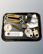 A tray of padlocks, enamelled thermometer,