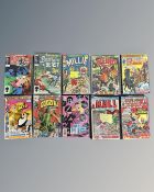 A group of vintage Marvel comics including Kid Colt, Weird Wonder Tales, Beauty and the Beast,