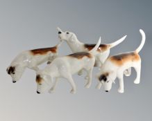 Four Beswick beagles.