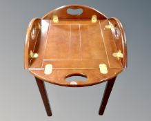 A butler's table with lift off tray