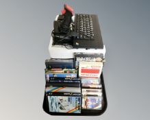 A Sinclair ZX Spectrum in original box with internal packaging together with a quantity of games