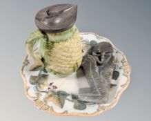 A Davenport plate, a soapstone tribal carving, a pewter mounted jug and a Japanese export vase.