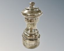 A silver pepper mill, David Shaw Silverware Ltd, London 1980, height 11cm.