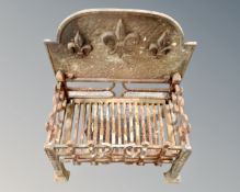 A nineteenth century cast iron fire grate