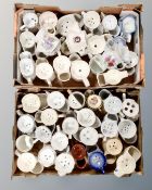 Two boxes containing a quantity of shaving mugs