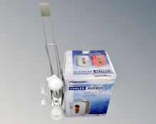 A Fridgemaster cooler and warmer together with two contemporary desk lamps