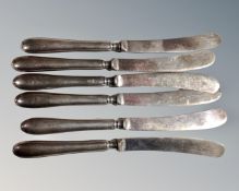 A set of six silver handled butter knives