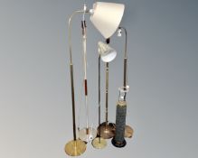 Six assorted continental floor lamps.