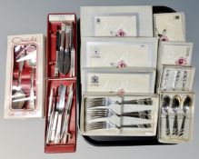 A tray of assorted stainless steel cutlery including Community and Viners