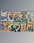 A group of vintage DC Scalphunter comics.