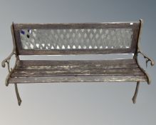 A cast iron framed garden bench