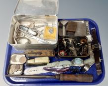 A tray of assorted wristwatches, keys, trinkets, vintage razor, tin, coins etc.