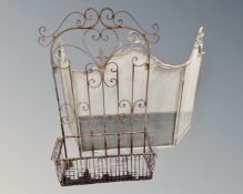 Two metal fire screens.