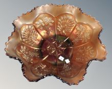 An American Fenton Amethyst Peacock and grape carnival glass bowl,