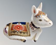 A Royal Crown Derby Donkey Foal paperweight with silver stopper.