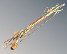 A bundle of tribal bows and arrows,