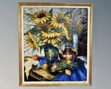 Continental School : Still life with fruit and sunflowers, oil on canvas, 64cm by 74cm.