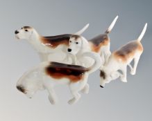 Four Beswick beagles.