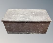 An antique pine blanket box