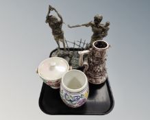 A tray containing a Capodimonte cherub embossed jug, a Poole pottery vase,