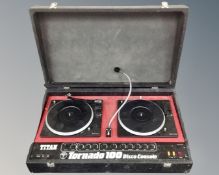 A Titan Tornado 100 twin deck disco console in case.