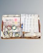 A box containing a quantity of plastic multi-compartment storage boxes, fishing tackle kit, hooks,