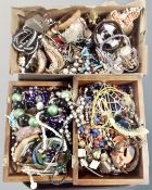 A tray containing a large quantity of costume jewellery.