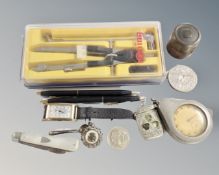 A tray containing a vintage travelling inkwell, a silver mother of pearl fruit knife, a vesta case,