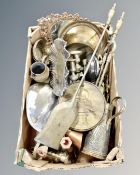 A box of antique and later metal wares to include companion pieces, candlesticks,