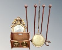 A wooden boot rack together with a magazine rack,