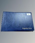 An album of cigarette cards : John Player - Regiments, De Reszke - Antique Pottery,