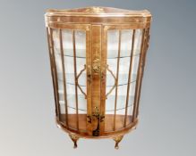 A Chinoiserie walnut D-shaped display cabinet