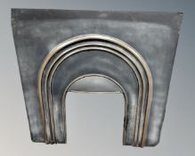 A cast iron fire surround,