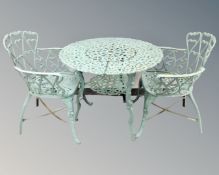 A four piece cast iron patio set.