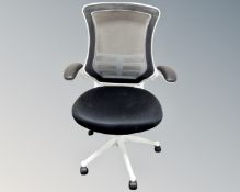 An office armchair upholstered in a black mesh fabric (white)