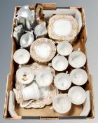 A box of three-piece Picquot ware tea service, hip flask,