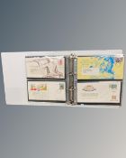 An album containing 126 First Day Cover stamps