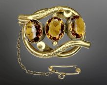 A Victorian pinchbeck citrine brooch,
