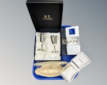 A tray containing a pair of Arthur Price goblets,