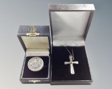 A gent's silver signet ring inset with a coin,