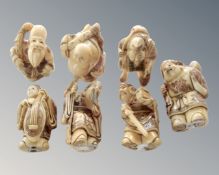 Seven Japanese resin netsukes.