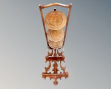 A carved corner wall bracket and a cake stand